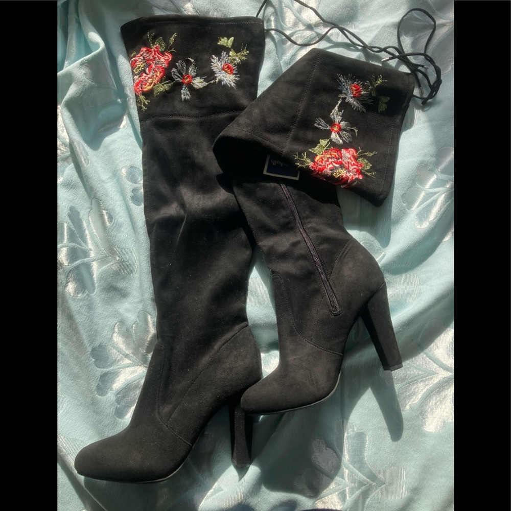 Black over-the-knee boots with floral embroidery